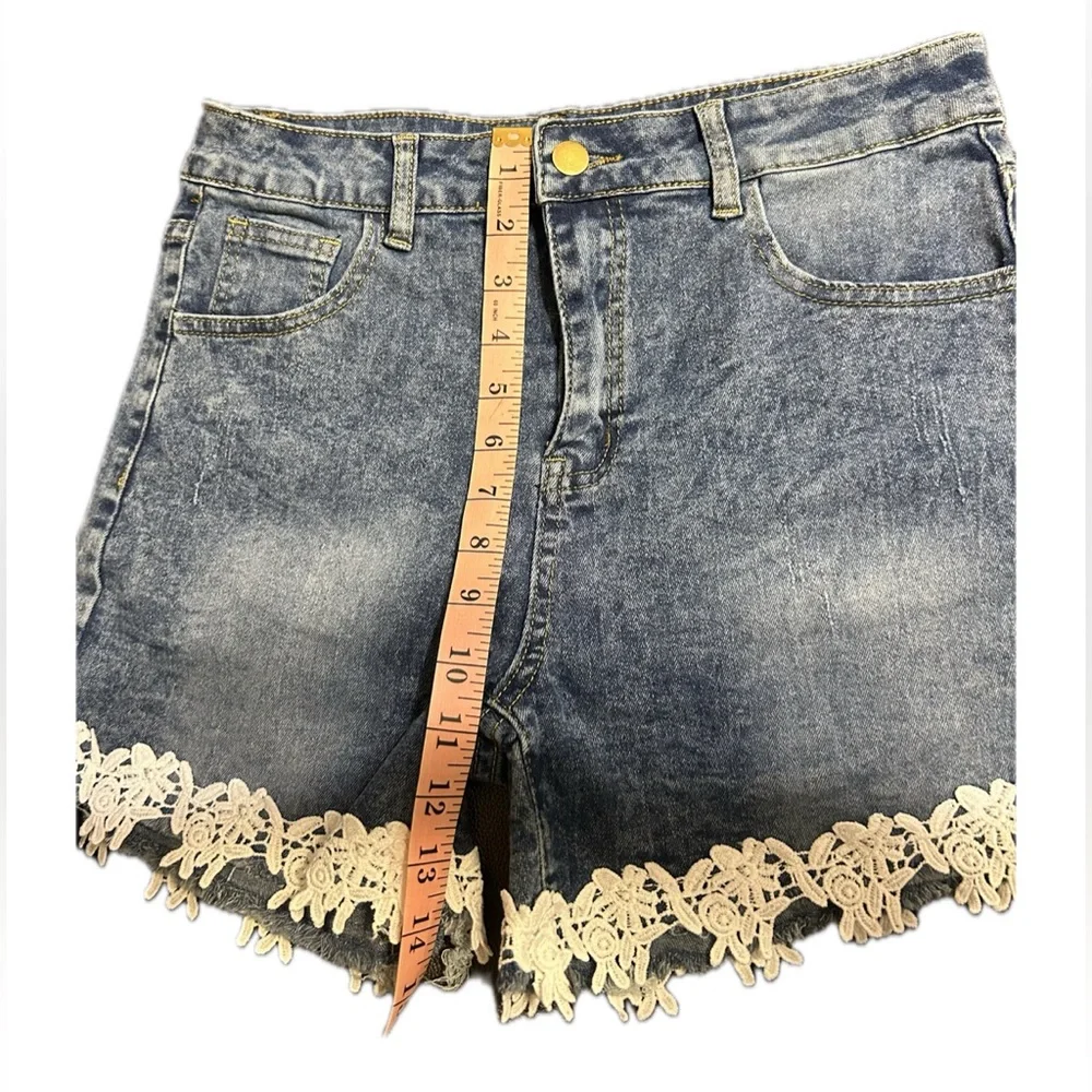NWOT Denim Shorts with Lace Hem.